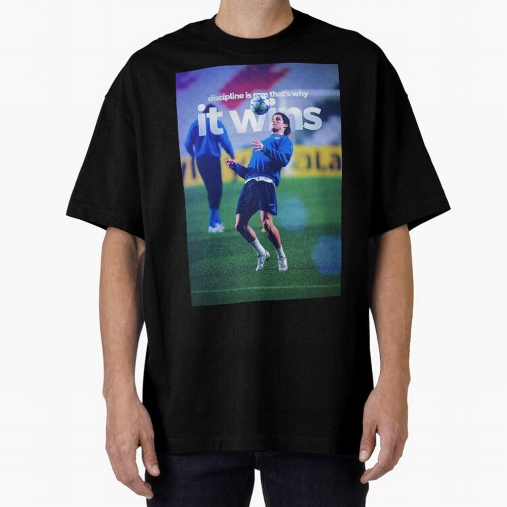 Cristiano Ronaldo - Discipline is rare that's why it wins Oversized T-Shirt Relive the Noise and Pride of Global Football Passion for FIFA World Cup 2026, Made for CR7, England and Germany, Match Day Excitement, Supporter Culture, Golden Goals and