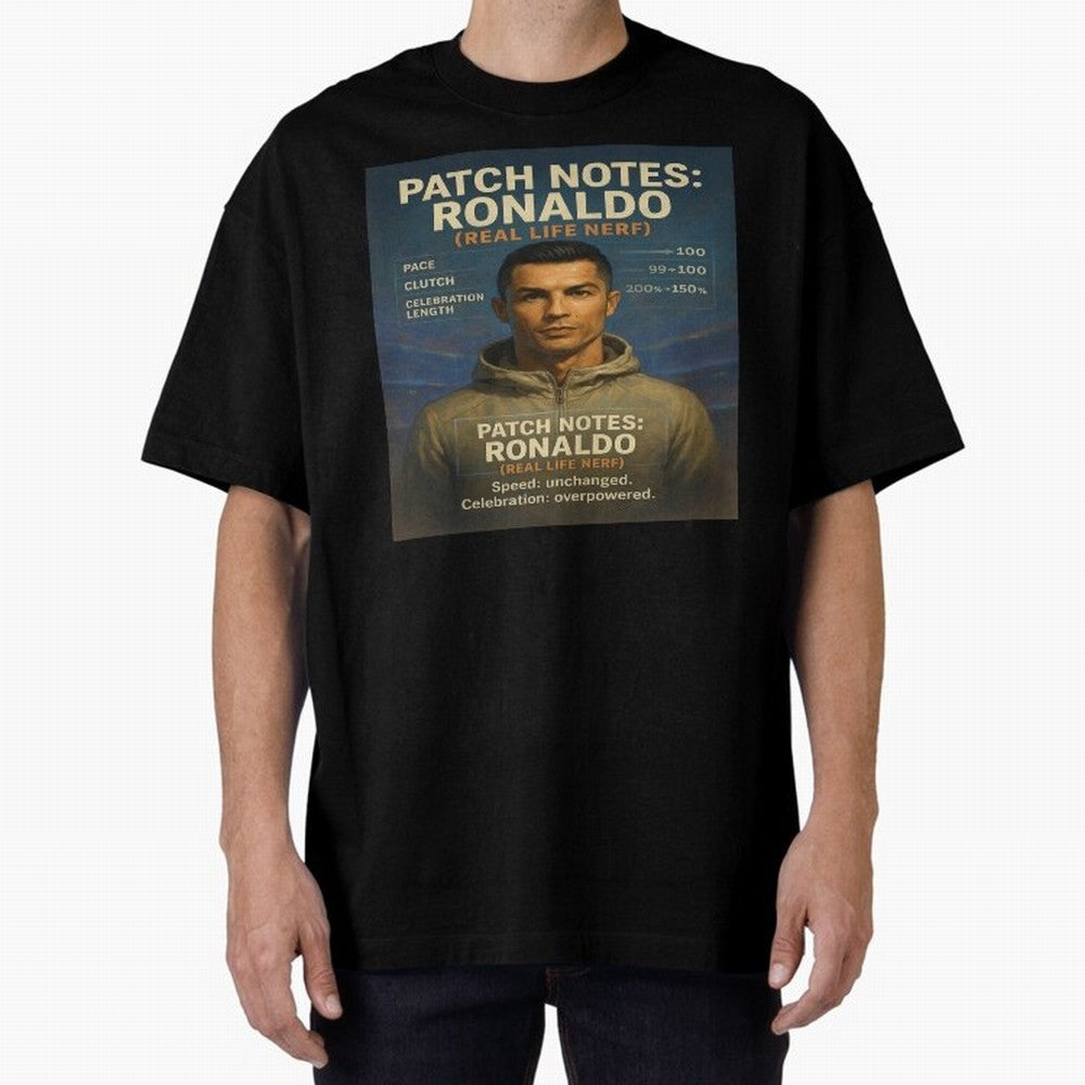 Patch Notes Cristiano Ronaldo ¡ª Real Life Nerf Football Gamer Oversized T-Shirt Celebrate Rivalries and Pride in Match Day Hype around FIFA World Cup 2026 Group Stage, Mbappe and Neymar, Brazil, Sports Nostalgia, International Competition, Famous