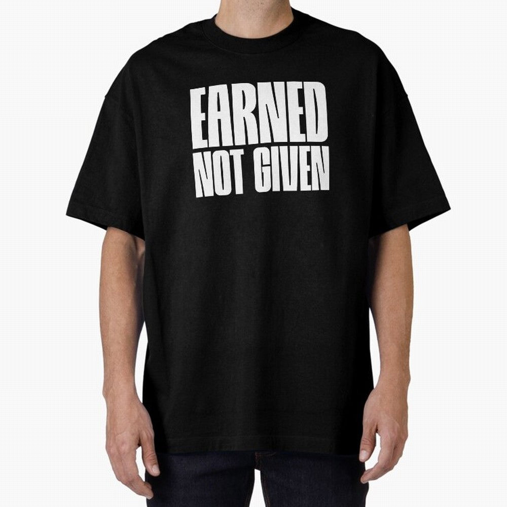 Earned not given white Oversized T-Shirt Bring Champion Energy into Global Football Passion for FIFA World Cup 2026 Group Stage, Featuring Neymar, Haaland and Cristiano Ronaldo, Spain and Netherlands, Vintage Soccer Flavor, Modern Football Stars,