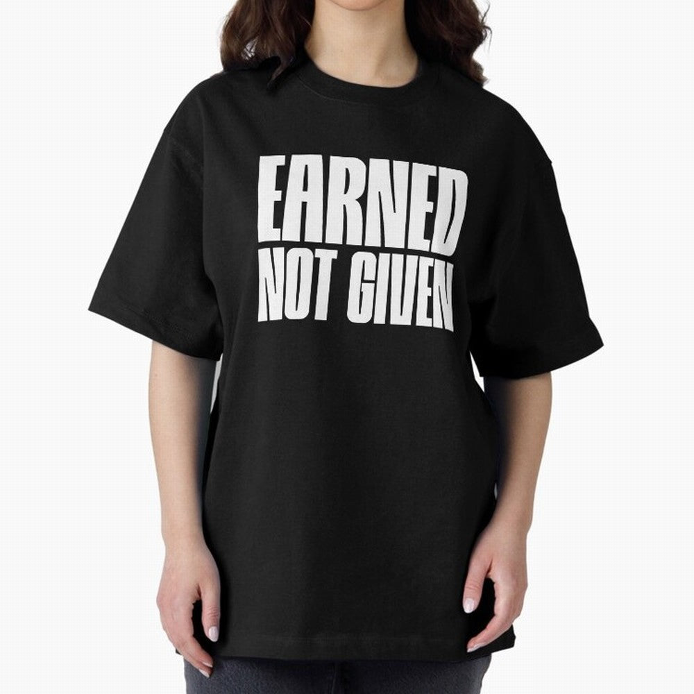 Earned not given white Oversized T-Shirt Bring Champion Energy into Global Football Passion for FIFA World Cup 2026 Group Stage, Featuring Neymar, Haaland and Cristiano Ronaldo, Spain and Netherlands, Vintage Soccer Flavor, Modern Football Stars,
