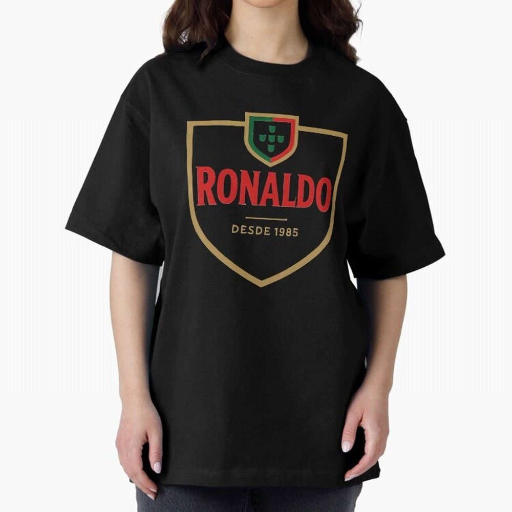 Ronaldo Emblem Sticker ¨C Gold Crest Parody Design Oversized T-Shirt Unlock FIFA World Cup 2026 with Messi, CR7 and Mbappe, Netherlands Energy, Championship Spirit, Famous Goals, Roaring Crowds and International Football Unity; Perfect for