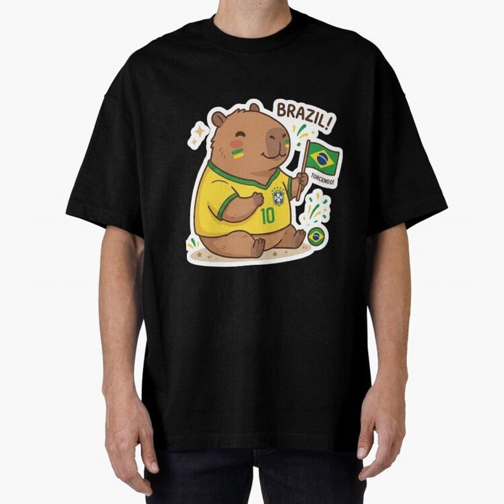 Capivara Torcedora Oversized T-Shirt Honor the Football Icons of FIFA World Cup 2026 Spirit, Featuring England, Messi, Vintage Soccer Flavor, Modern Football Stars, National Flags and Final Night Emotion; Great for Watch Parties, Sports Bars,